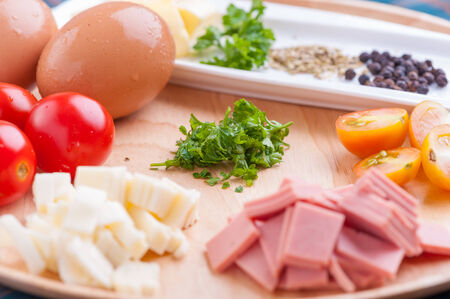 Ingredients for scramble egg on wood table.の写真素材