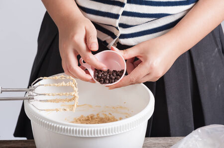 Pouring ingredient into a cup