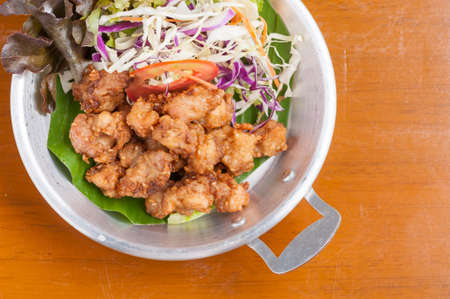 Fried chicken ball in steel bowlの写真素材