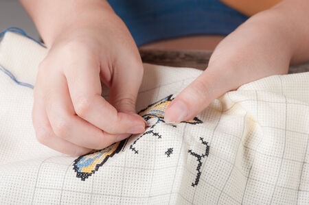 Cross-stitch, a housewife hobby in spare time.の写真素材