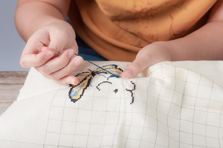 Cross-stitch, a housewife hobby in spare time.の写真素材