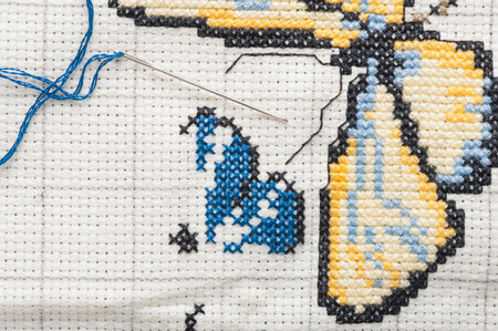 Cross-stitch, a housewife hobby in spare time.の写真素材