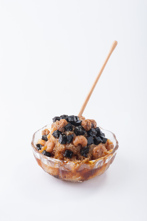Longan flavored shave ice with Chinese black jelly and dried longan.の写真素材