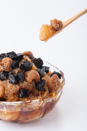 Longan flavored shave ice with Chinese black jelly and dried longan.の写真素材