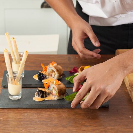 chef preparing for Japanese fusion food setの写真素材