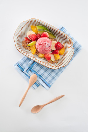 Berry ice cream scoop with mixed fruits.の写真素材