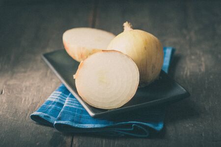 Vegetables on wood table with film filter effectの写真素材
