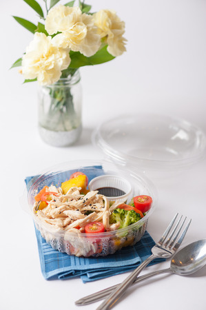 Salad soba with vegetables and shred chicken cooked by clean food concept in lunch box on white tableの写真素材