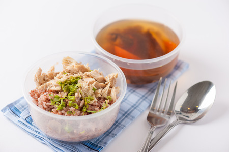 Brown rice gruel with chicken breast with vegetables soup cooked by clean food concept in separate...