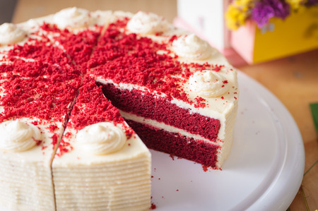 Red velvet cake on wood table with morning sceneの写真素材