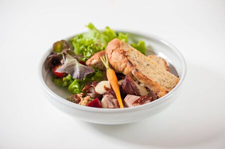 Modern style salad with garlic toast and grilled pork with barbecue sauceの写真素材