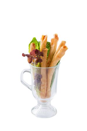 Front view of Chinese fusion style shrimp spring roll in glass isolated on white backgroundの写真素材