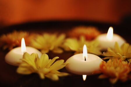 Close Up Of Aroma Bowl With Candles And Flowersの写真素材