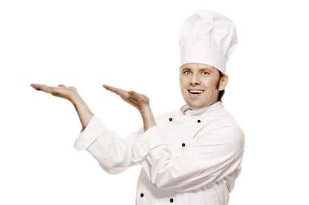 Chef presenting something, isolated on whiteの写真素材