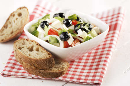 Greek salad with breadの写真素材