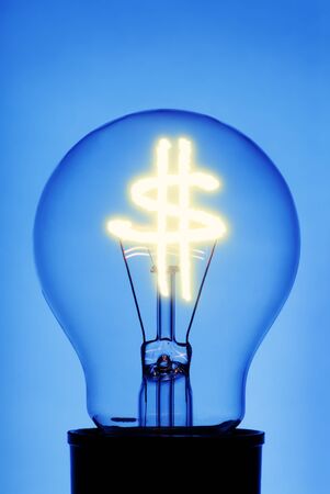 Light bulb with Dollar Symbol on blue backgroundの写真素材