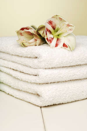 Beauty Arrangement With Towels And Candles On White Table, selective focusの写真素材