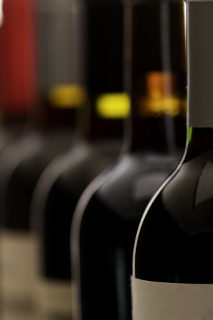 a group of wine bottles, very shallow DoF - on the front labelの写真素材