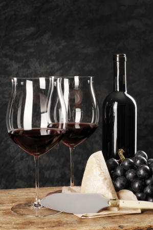 red wine, cheese and grapesの写真素材