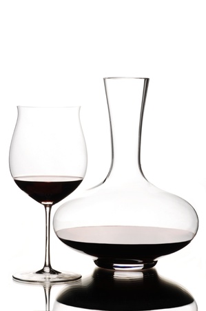 Red wine and decanter on white backgroundの写真素材