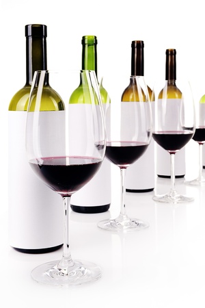 Blind wine tasting on white, masked labels of wine bottles, selective focusの写真素材