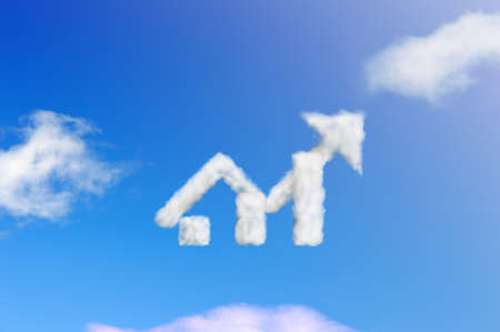 Cloud shape arrow pointing up on a blue sky. Sales concept