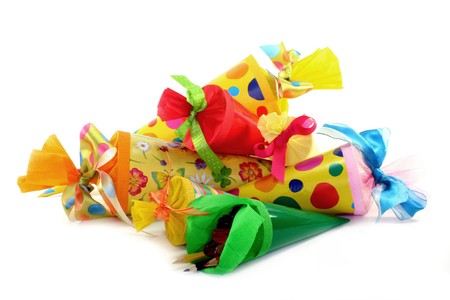 different colored school cones on a white backgroundの写真素材