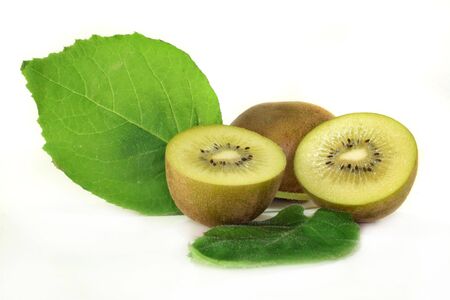 halved kiwi fruit on white backgroundの写真素材