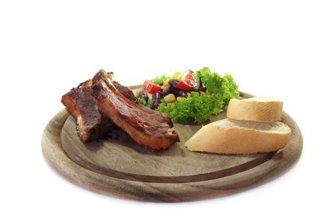 fried spare ribs with bread salad and Texasの写真素材