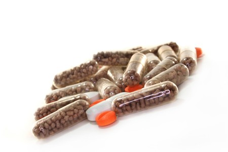 different pills on a white backgroundの写真素材