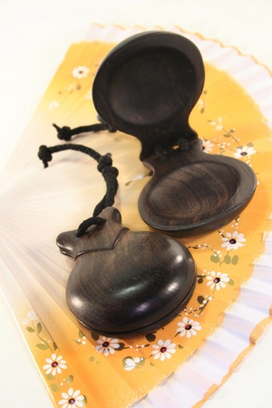 two castanets on a Spanish fanの写真素材