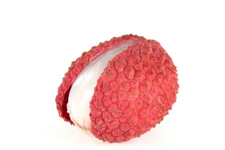 fresh red lychees on a white backgroundの写真素材
