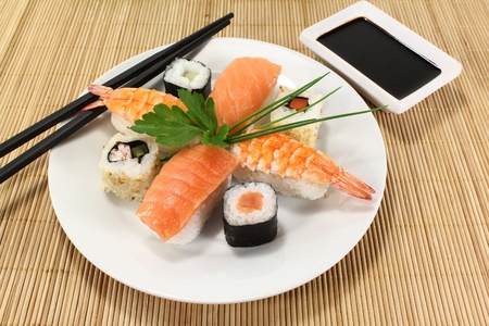 variety of sushi with parsley and chivesの写真素材