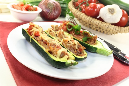 baked zucchini filled with mince meat and tomatoの写真素材