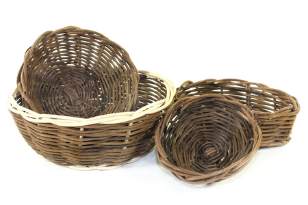 braided wicker baskets against a bright backgroundの写真素材