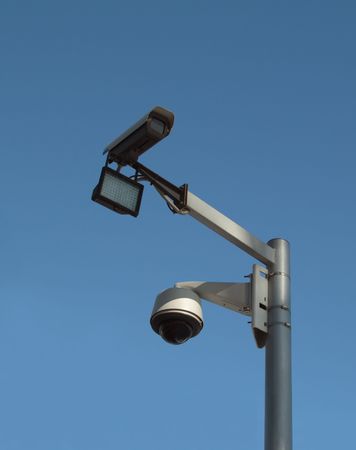 security video camera and blue sky