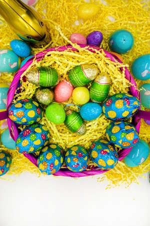 Top view shot of Colourful Easter Eggs on white background, Happy Easter holiday background concept.
