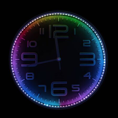 Colorful pointer clock illuminated with colorful LEDの写真素材