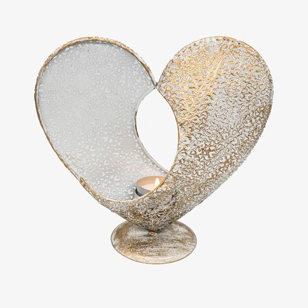 A heart shaped tea light from the front, cut out on white backgroundの写真素材
