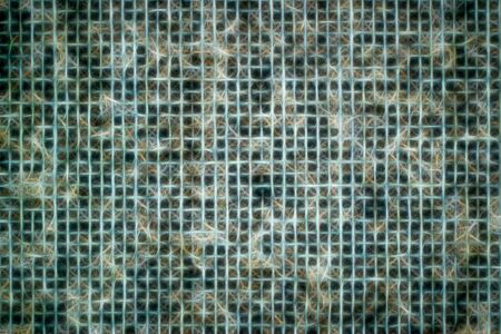 Macro shot of fine fabric threads in square shape and recessesの写真素材
