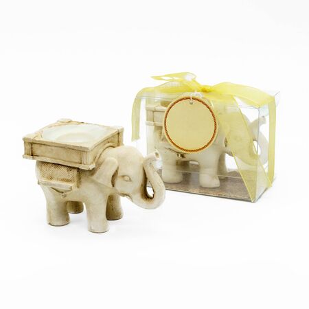 A candle holder in the shape of an elephant, white backgroundの写真素材
