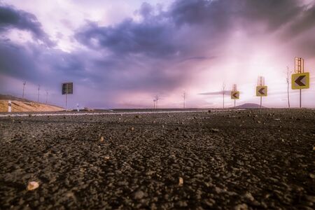 A street on a purple cloudy skyの写真素材
