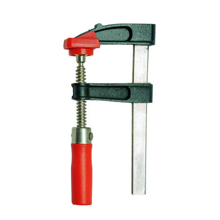 A black and red screw clamp, isolatedの写真素材