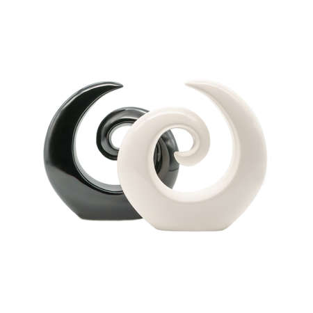 A white and black vase sculpture on a white background, isolatedの写真素材