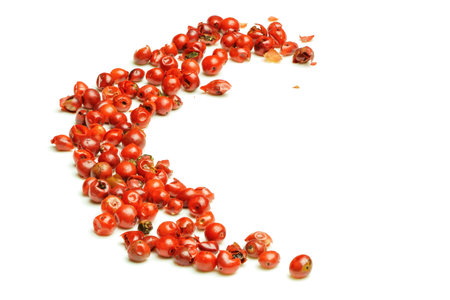 Macro close up of mixed pink pepper berries in studioの写真素材