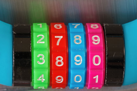 Close up of a colorful combination lock and their numbersの写真素材