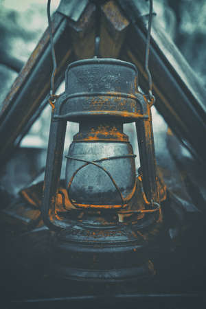 A very old metal mining oil lampのeditorial素材