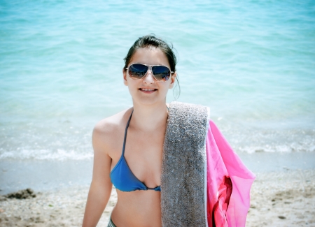 Young girl on the beachの写真素材