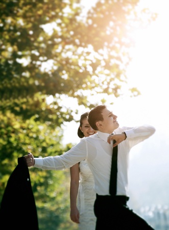Young man dancing for a beautiful ladyの写真素材