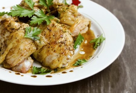 Grilled Chicken legs with sauce and parsleyの写真素材